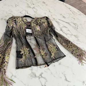 TWICE IN A LIFE TIME TOP